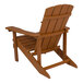 A teak faux wood Adirondack chair with armrests.