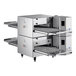 A Cooking Performance Group countertop impinger conveyor oven with two stacked shelves.