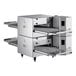 A Cooking Performance Group double stacked countertop impinger conveyor oven with two shelves.