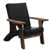 A black Mayne Mesa patio chair with wooden armrests.