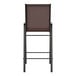 A brown Flash Furniture barstool with a black steel frame.