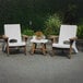 A white Mayne Mesa chair and table set on an outdoor patio.