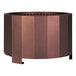 A round bronze steel fire pit with a curved design.