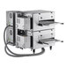 A white Cooking Performance Group double stacked countertop conveyor oven with two conveyor belts.