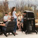 A Blackstone outdoor pizza oven on a patio.