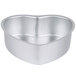 A silver Wilton heart shaped cake pan.