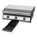 A black and silver Blackstone electric drop-in griddle on a counter.