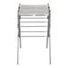 A silver metal Household Essentials drying rack with four metal rods.