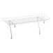 A white steel wire shelf for over the washer storage on a white background.