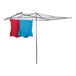 A Household Essentials steel outdoor clothes drying rack with clothes on the line.