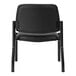 A Boss black vinyl guest chair with a black back and seat and metal legs.