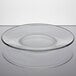 An Anchor Hocking clear glass plate on a white surface.