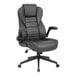 A black Boss office chair with armrests.