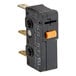 A black Mahlkonig micro switch with a yellow button.