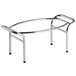 A chrome Vollrath display stand with a round metal base.