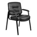 A Boss black leather guest chair with padded armrests and a metal frame.