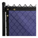 Navy blue PVC mesh fence screen on a chain link fence.