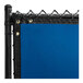 A close-up of a royal blue PVC privacy fence screen on a black pole.