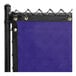 Navy blue FenceScreen on a fence with black metal posts.