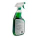 A green bottle of Simple Green Sassafras scented cleaner with a white label.