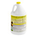 A white jug of Simple Green Lemon Scent Concentrated Industrial Cleaner with a yellow label.