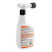 A close-up of a white Simple Green Pro spray bottle with an orange and black label.