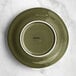 An Acopa Highlands juniper green china bowl with a wide white rim.