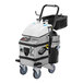 A Blue Evolution Steam Hero portable dry steam vacuum cleaner with wheels and a white container.