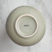 An Acopa Heather Gray China bouillon cup with a white rim.