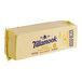 A rectangular white Tillamook Medium White Cheddar cheese box with a rectangular yellow block of cheese inside.