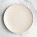 An Acopa Highlands white coupe china plate on a white background.