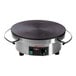A Krampouz round electric cast iron crepe maker with a black handle.