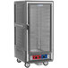 A large grey Metro C5 holding and proofing cabinet with a clear door.