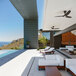 A Big Ass Fans Haiku Coastal outdoor ceiling fan on a patio table.