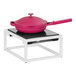 A pink pan with a lid on a white Range Countertop Induction Burner.