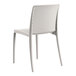 A white plastic chair with a white back.