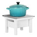 A white Cal-Mil chafer alternative stand with a blue pot on top.