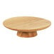 A Cal-Mil Sydney round oak cake stand with a wooden base.