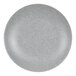 A close-up of a gray speckled Cal-Mil melamine coupe plate.