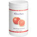 A white plastic container of Perfect Puree Blood Orange Concentrate with a label.