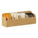 A brown box with 4 compartments for different types of condiments.