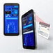 A pair of cell phones with the Minor Decliner Smart Mobile-C ID Scanner screen displayed.