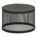 A black round Cal-Mil display stand with perforated metal mesh.