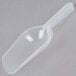 A clear plastic scoop with a handle.