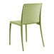 A Lancaster Table & Seating Rio sea moss green resin side chair with legs on a white background.