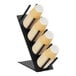 A black organizer cup with four compartments holding coffee cups.