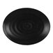 A black oval melamine platter with a ripples design.