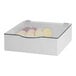 A white box with a clear lid holding round bowl lids.