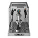 A silver Astra Gourmet automatic pourover espresso machine with black handles.