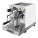 A silver and white Astra Gourmet espresso machine.